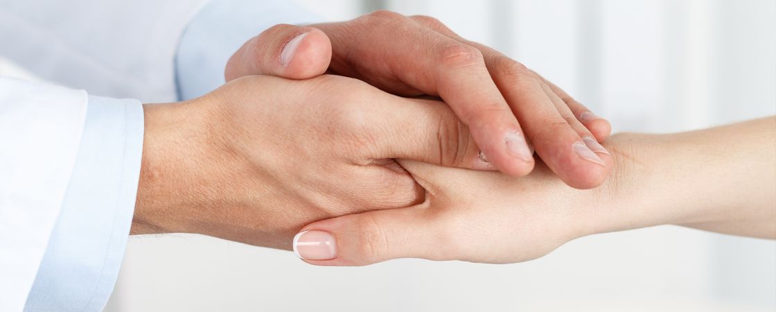 Family members holding hands