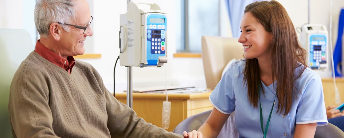 Nurse comforting patient